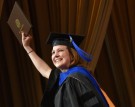 WMU graduate with diploma